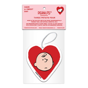 Heart-shaped air freshener with a cartoon character on a white background