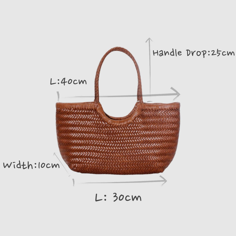 Hand-woven leather tote bag in chocolate brown on a white background