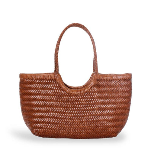 Brown woven handbag on a white background