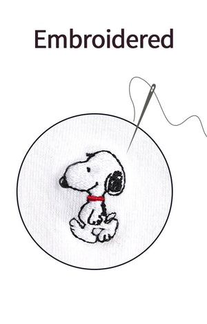 Embroidered design of Snoopy with a needle and thread on a white background