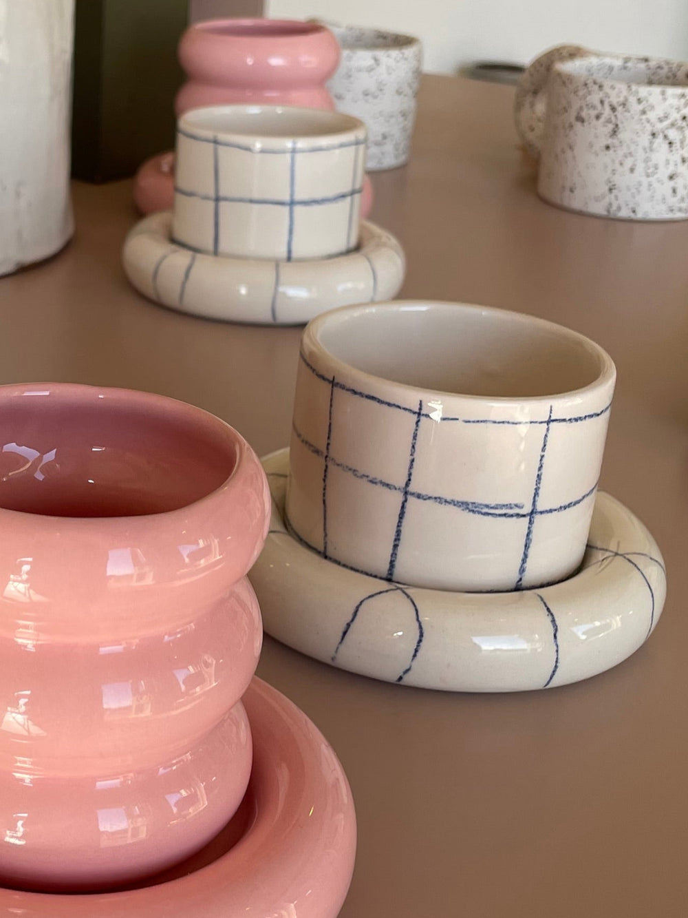 Checked Glazed Ceramic Cup and Saucer Set