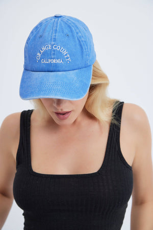 'Orange County'  Baseball hat In Washed Blue