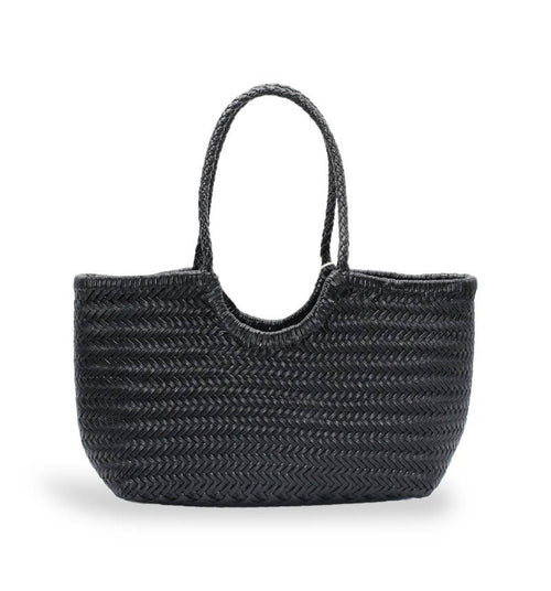 Black woven handbag on a white background