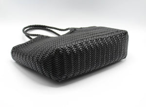 Side view of the hand-woven leather tote bag in chocolate brown.