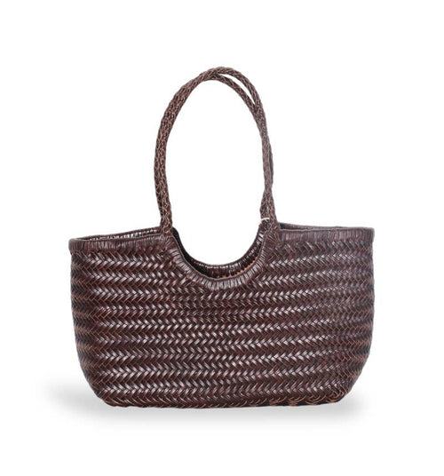 Hand-woven leather tote bag in chocolate brown on a white background