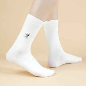 White socks with a small design Snoopy on a beige background