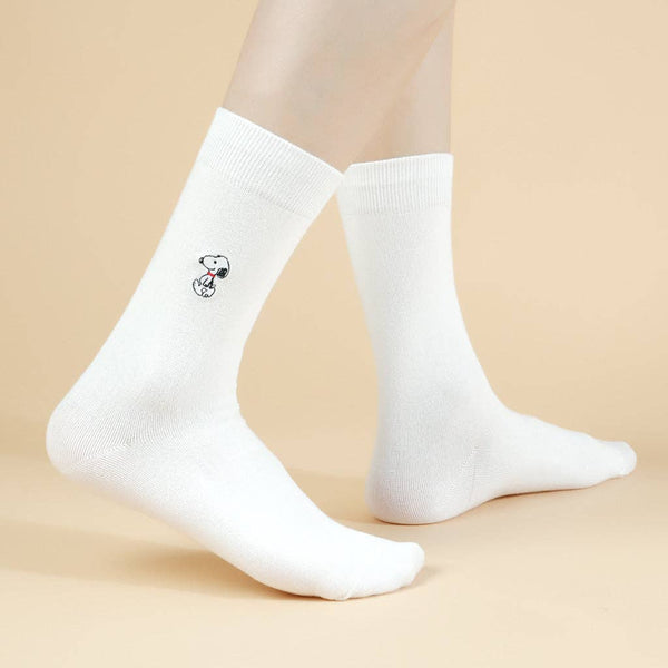 White socks with a small design Snoopy on a beige background