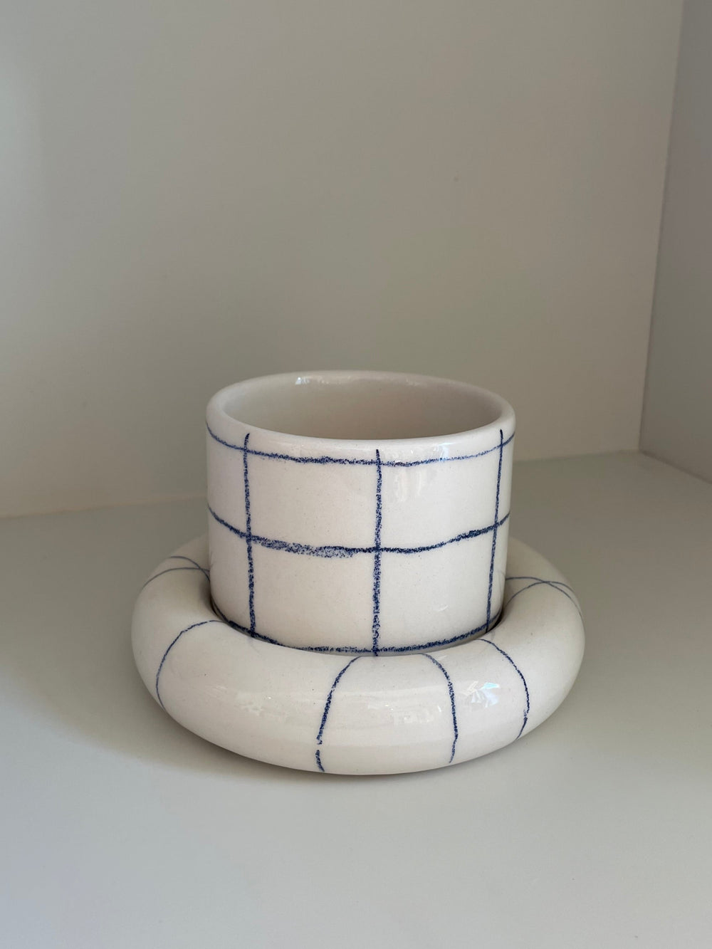 Checked Glazed Ceramic Cup and Saucer Set