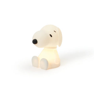 Snoopy-shaped night light on a white background