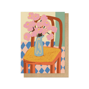 Flowers On A Chair Greetings Card