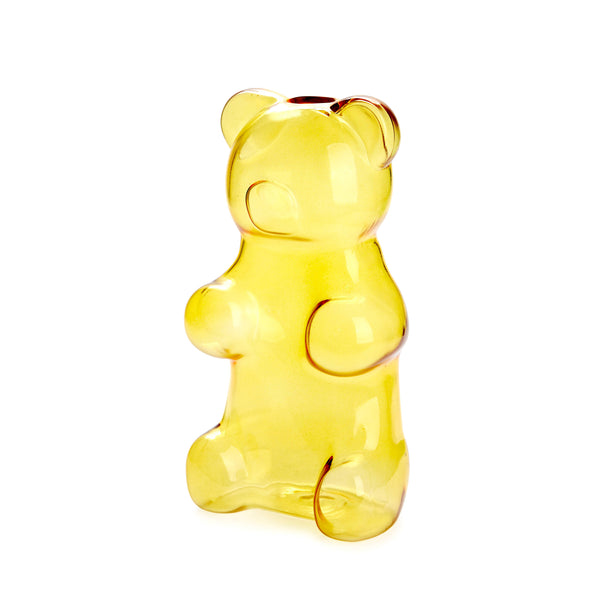 Yellow gummy bear-shaped vase on a white background